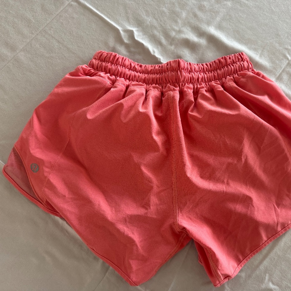 Salmon/pink Lululemon shorts